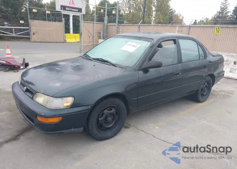 1997 Toyota Corolla Std z USA, uszkodzony, nr VIN 1NXBA02E1VZ619295